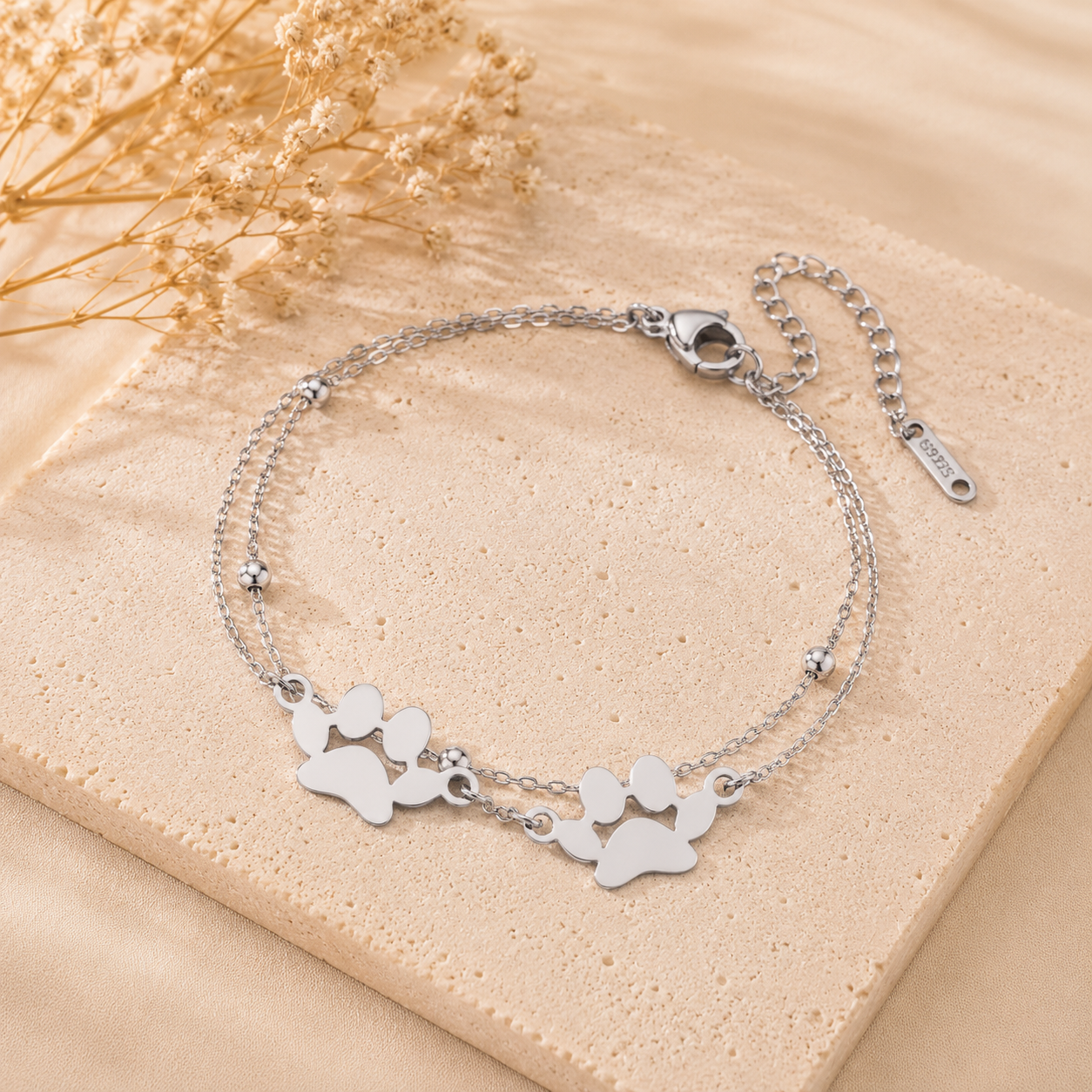 Armband 2 hondenpootjes